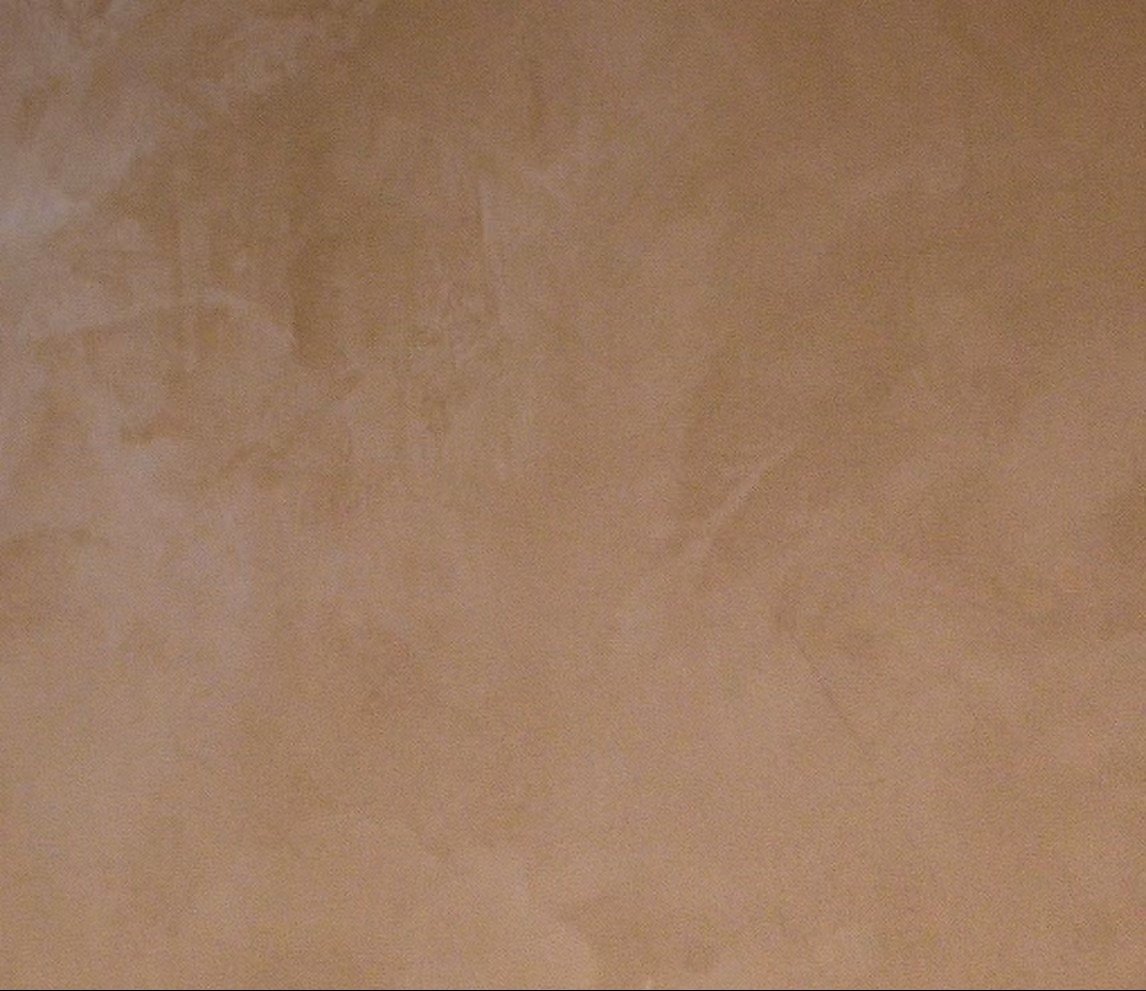 Polished Microtadelakt lime plaster surface with soft tonal movement