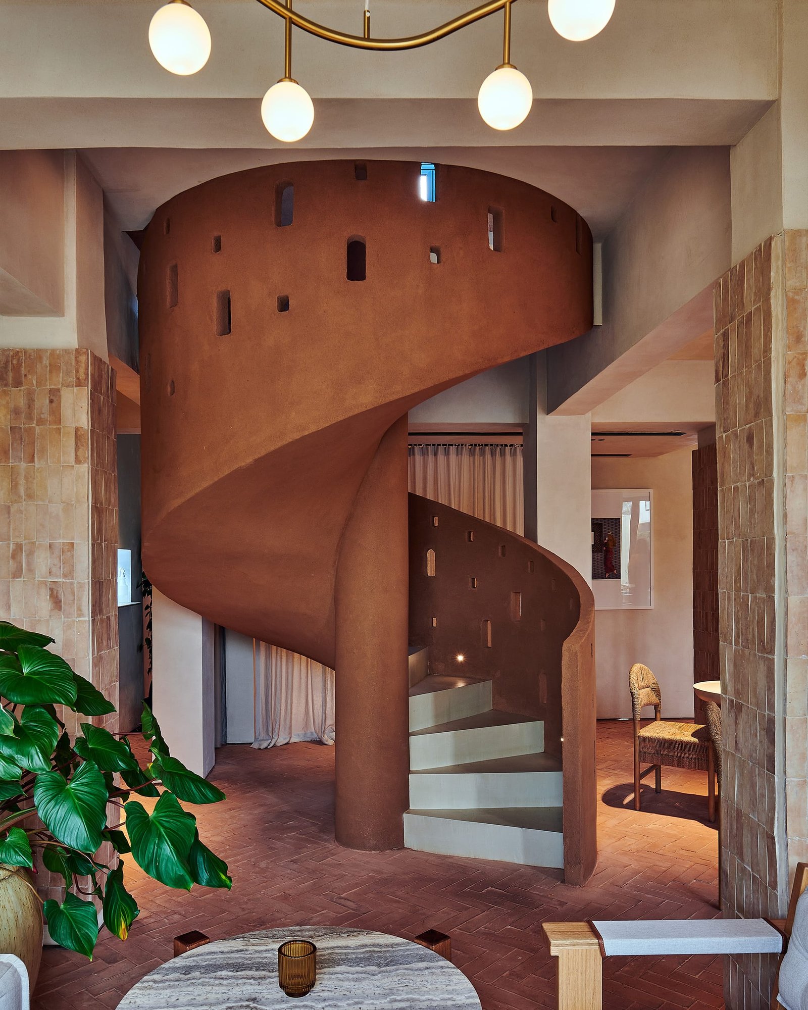 Demi Rustic Clayworks clay plaster on the spiral stair at Villa 515, Dubai
