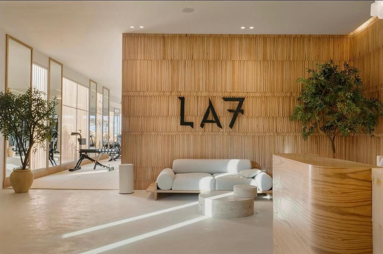 Seamless sand-toned microcement floor at LA7 Wellness Beach Club reception, Egypt