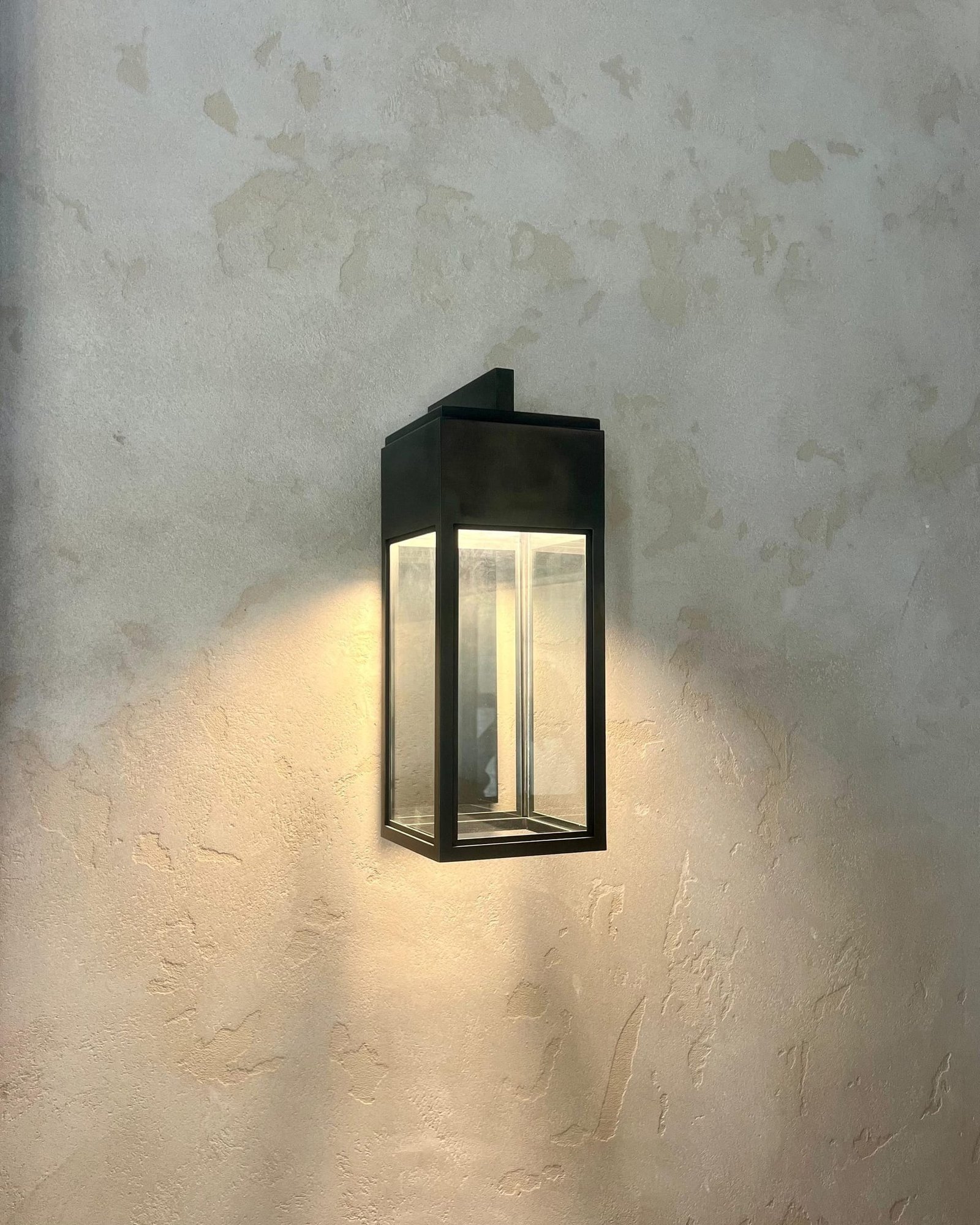 Close detail of a hand-finished Microdur Plus microcement wall showing subtle trowel movement, Jeddah