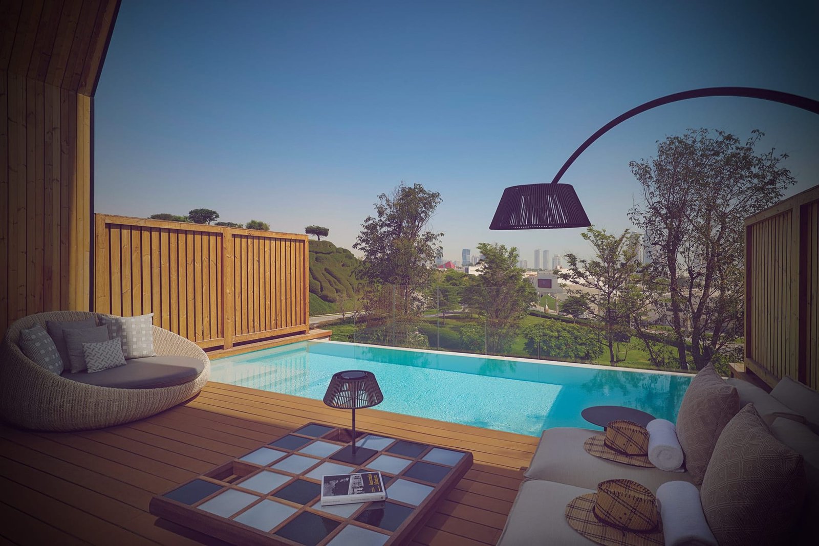 Seamless microcement plunge pool with a bench seat at Katara Hills, LXR Doha