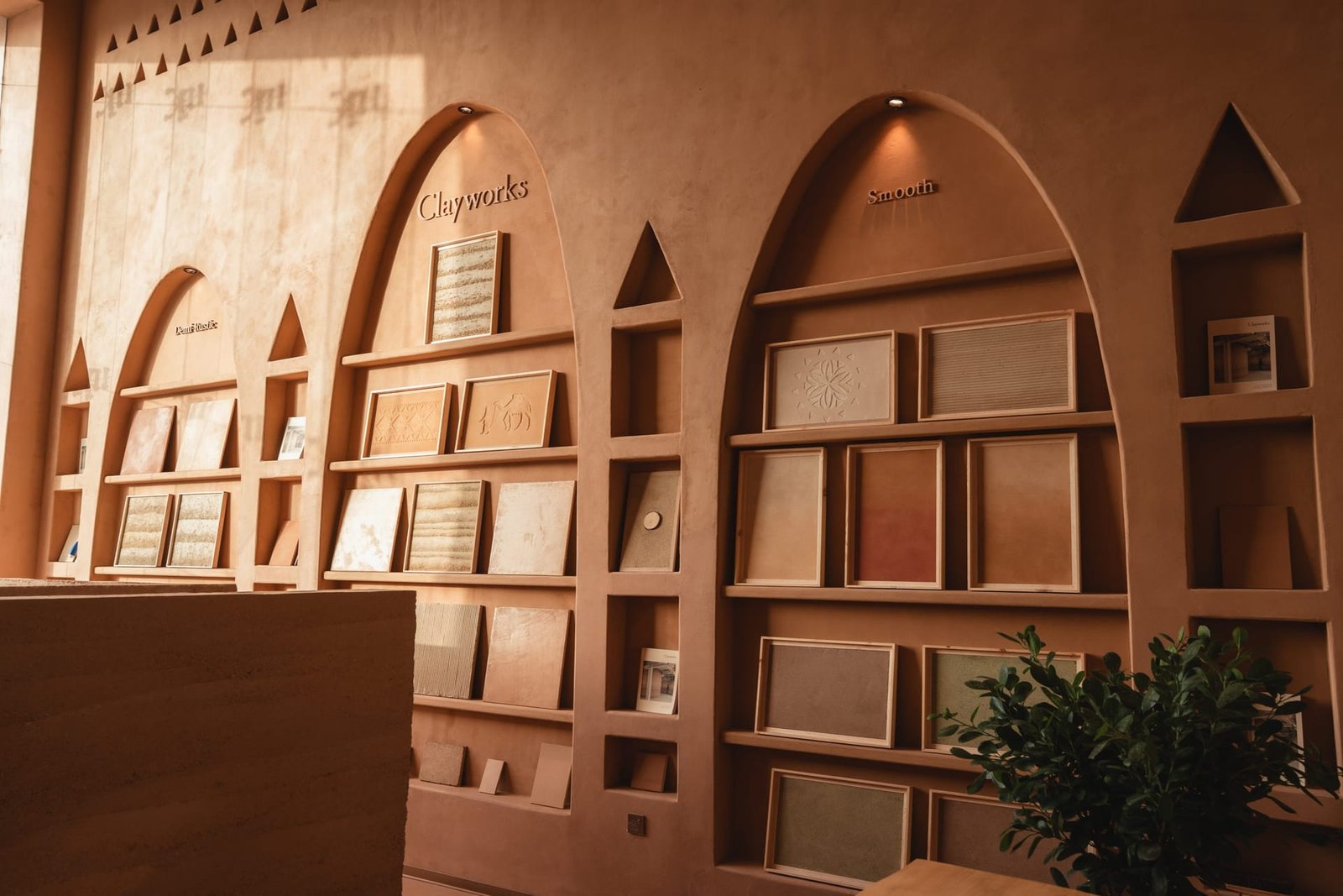 Rammed earth display wall at the Conmarble Natural Finishes showroom